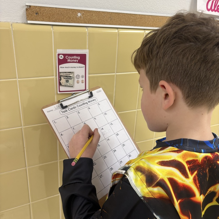 4th graders are counting coins and sharpening math skills—one penny, nickel, dime, and quarter at a time! 💰💸