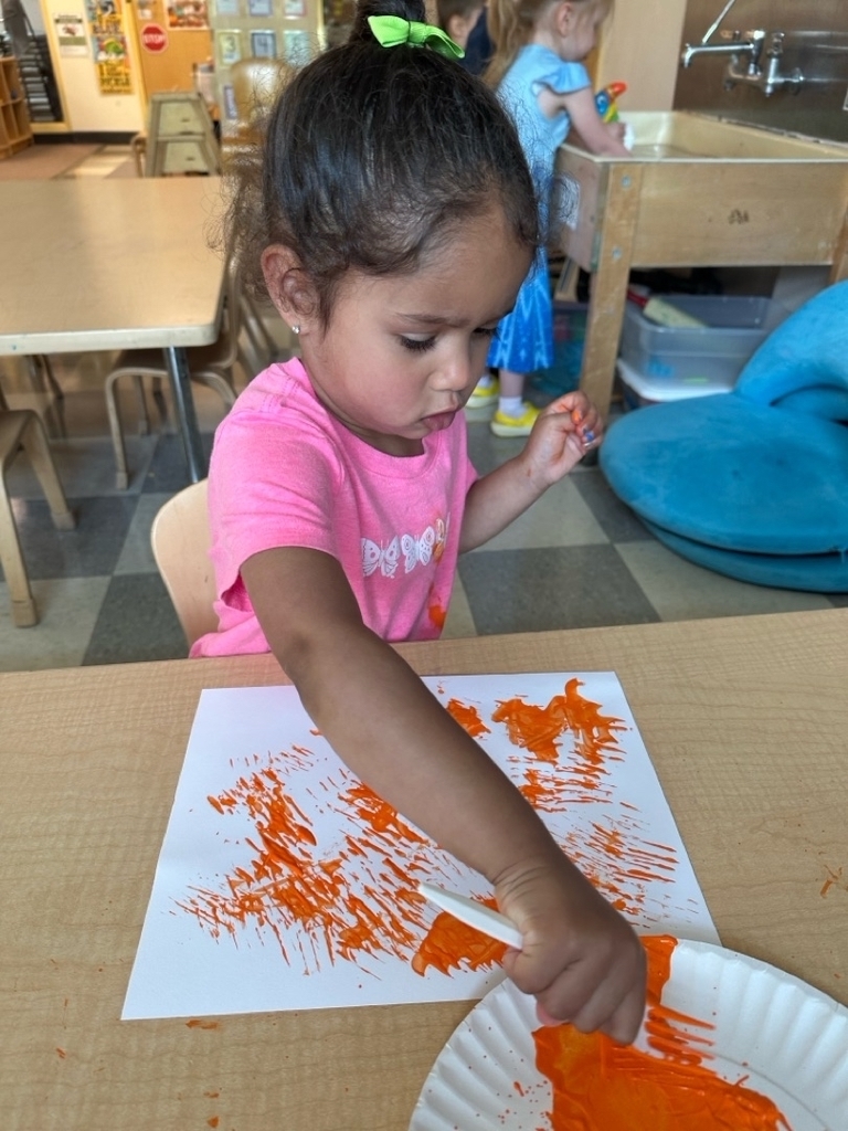 Rainbow fish student painting