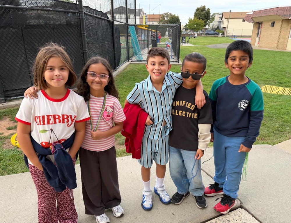 students smiling at school bash
