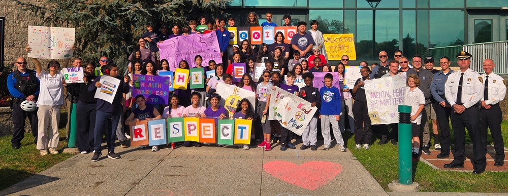 Group of Students in front of school building 