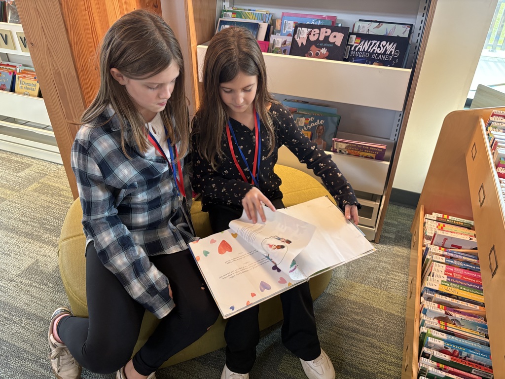 Samish Elementary students explore the Central Skagit Library, browsing bookshelves, learning how to use the library’s search system, and enjoying the play area during their field trip.