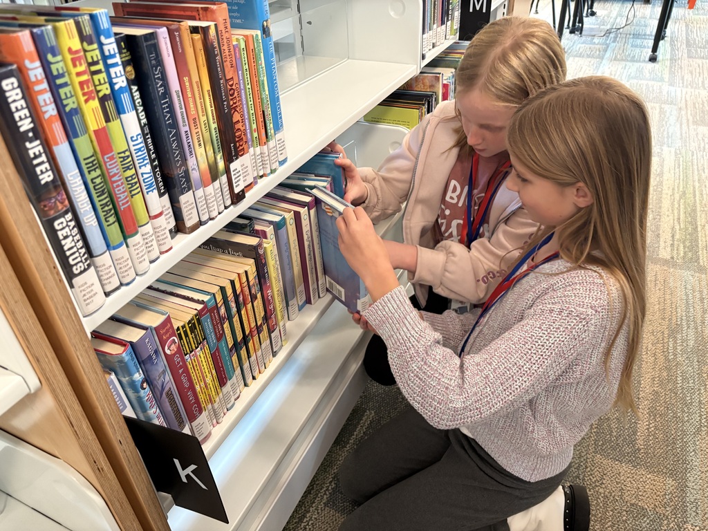Samish Elementary students explore the Central Skagit Library, browsing bookshelves, learning how to use the library’s search system, and enjoying the play area during their field trip.