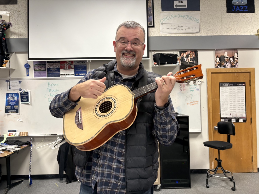 Instructor Brad Hendry plays and directs the mariachi band!