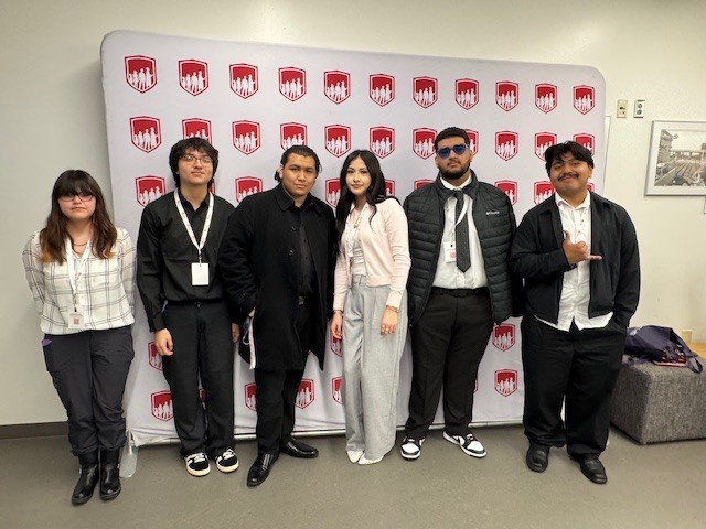 Students from Sedro-Woolley High School participating in a youth leadership conference, including group activities, presentations, and recognition of student achievements in writing and visual arts.