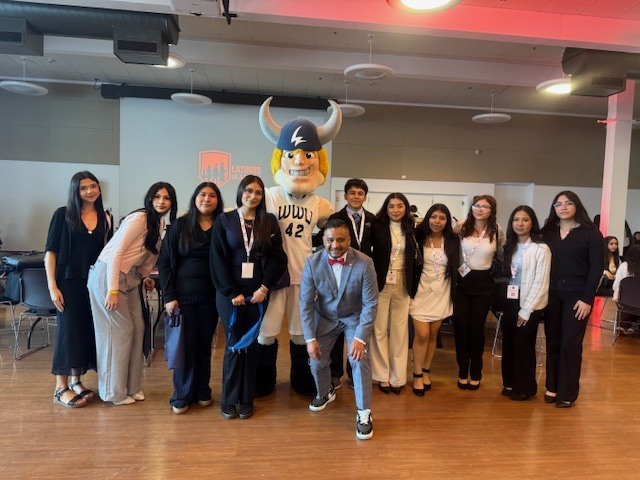 Students from Sedro-Woolley High School participating in a youth leadership conference, including group activities, presentations, and recognition of student achievements in writing and visual arts.