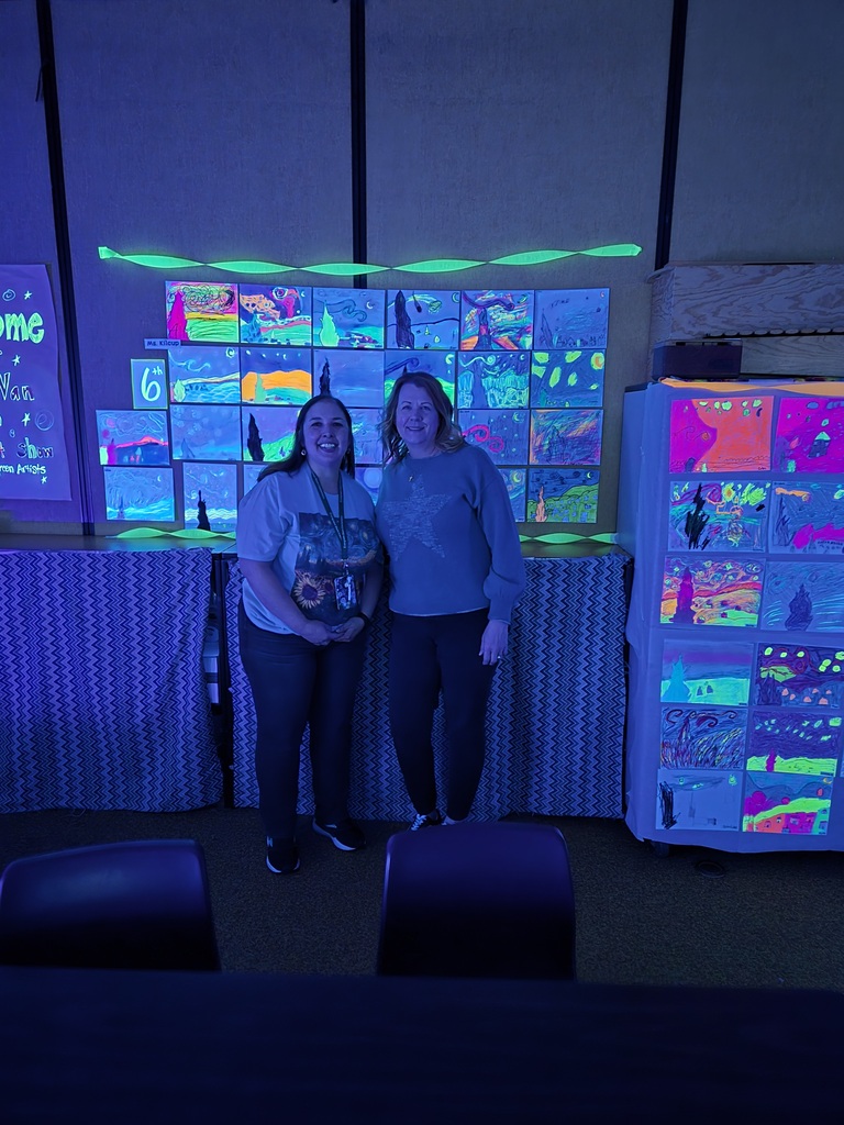 Students and families were able to explore glowing Vincent Van Gogh-inspired artwork during Evergreen STEM Elementary School’s art show and STEM Night. Displays feature colorful “Starry Night” and sunflower-themed student art illuminated under black lights.