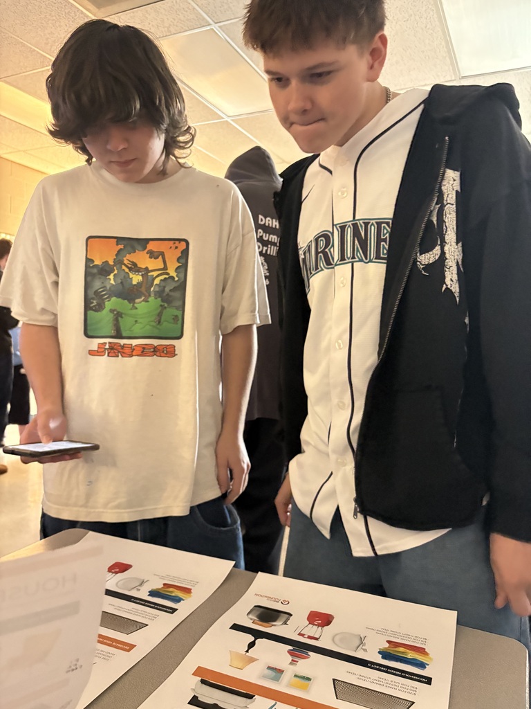 Sedro-Woolley High School students participate in the “Bite of Reality” financial simulation while speaking with WECU volunteers at different budgeting stations. Students review financial information, ask questions and make decisions about real-world expenses such as housing, transportation, groceries and childcare during the hands-on financial literacy activity.