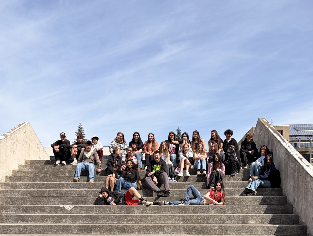 A group of Sedro-Woolley School District 7th grade AVID students pose for a photo during their annual visit to Western Washington University. Students stand together on campus while participating in a college exploration experience designed to introduce them to higher education opportunities and future career pathways.