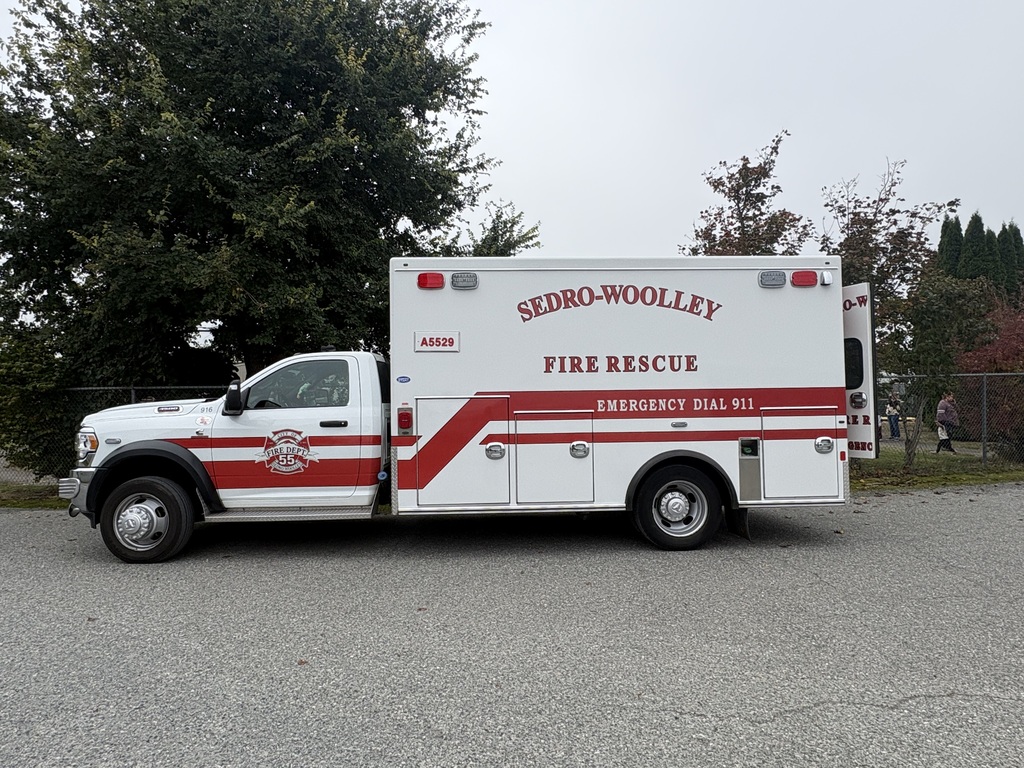 Photos show Good Beginnings Preschool students visiting with Sedro-Woolley firefighters and EMTs during Fire Prevention Week. Students explore a fire truck and ambulance, see emergency equipment up close and learn about fire safety and the work of local first responders.