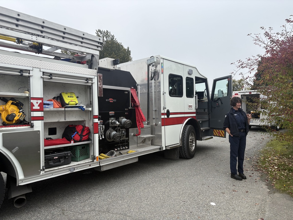 Photos show Good Beginnings Preschool students visiting with Sedro-Woolley firefighters and EMTs during Fire Prevention Week. Students explore a fire truck and ambulance, see emergency equipment up close and learn about fire safety and the work of local first responders.