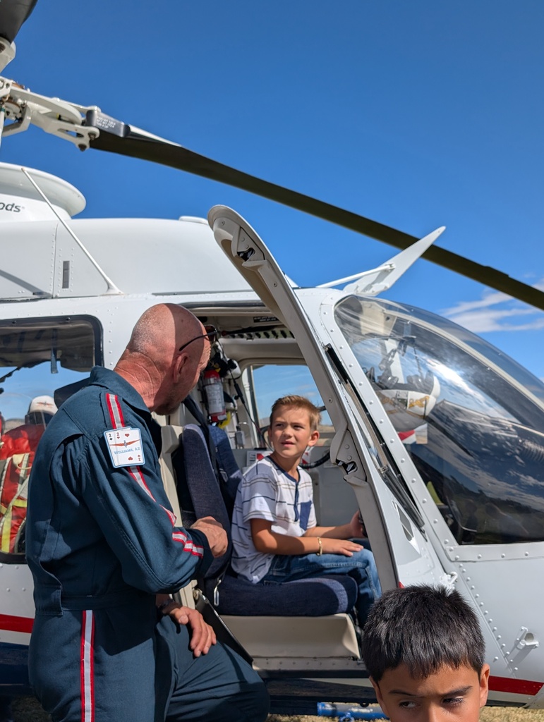 Kids sitting in the chopper