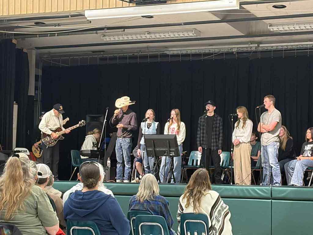 Students performing on stage