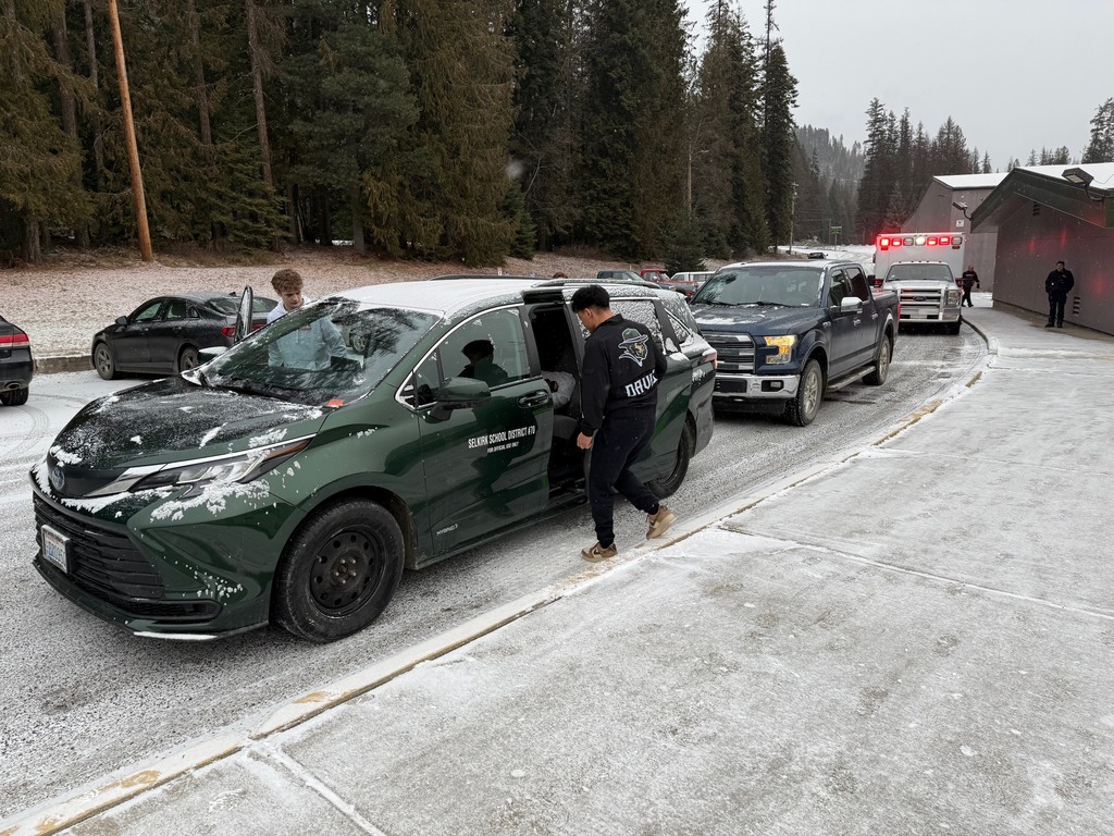 wrestlers enter school van to depart to state