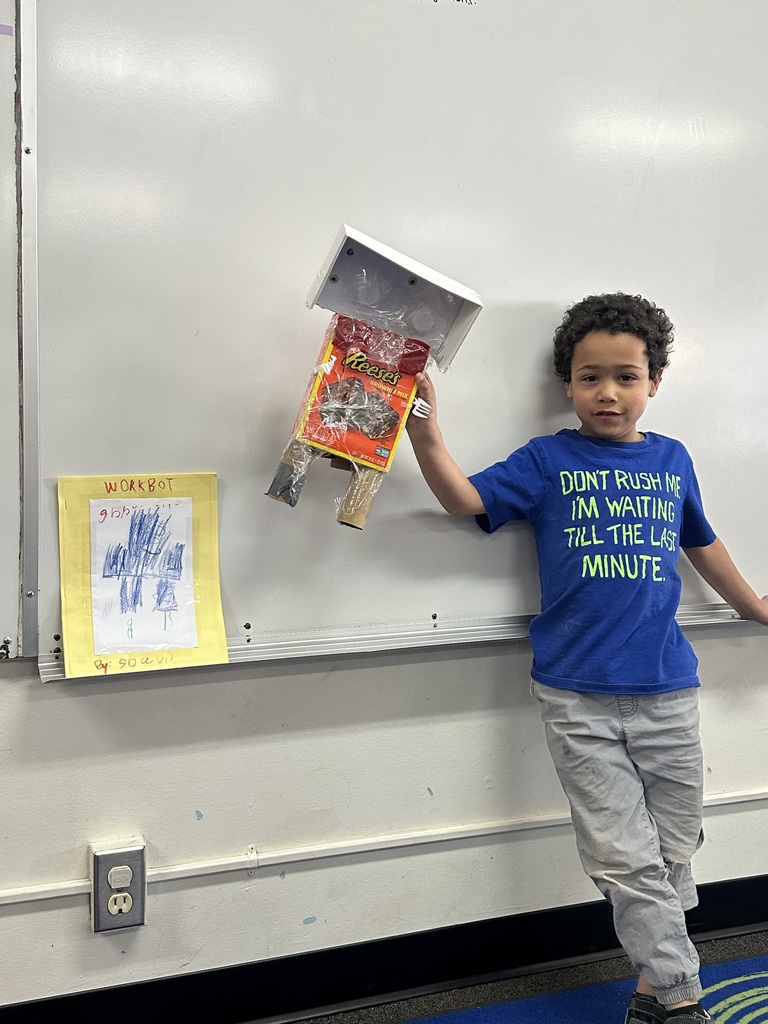 Boy with cereal box robot