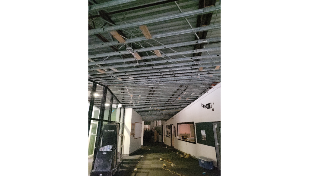 Abatement in the hallway by the office