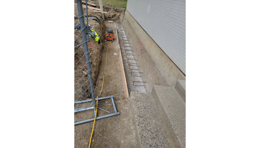 Footings along side the building