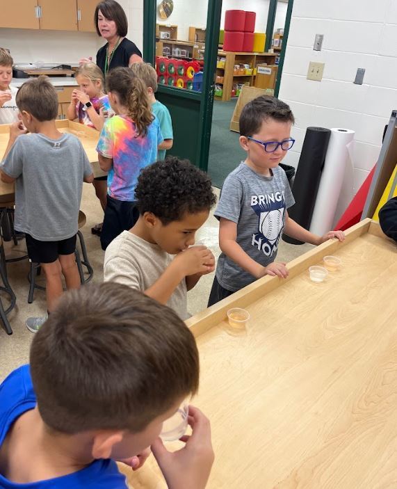 Miss Hannah’s math classes went to the library this week! We read The Lemonade Stand, then we had our very own lemonade tasting party. Students sampled both pink and yellow lemonade, then voted for their favorite. We graphed the results together and practiced collecting and interpreting data! 