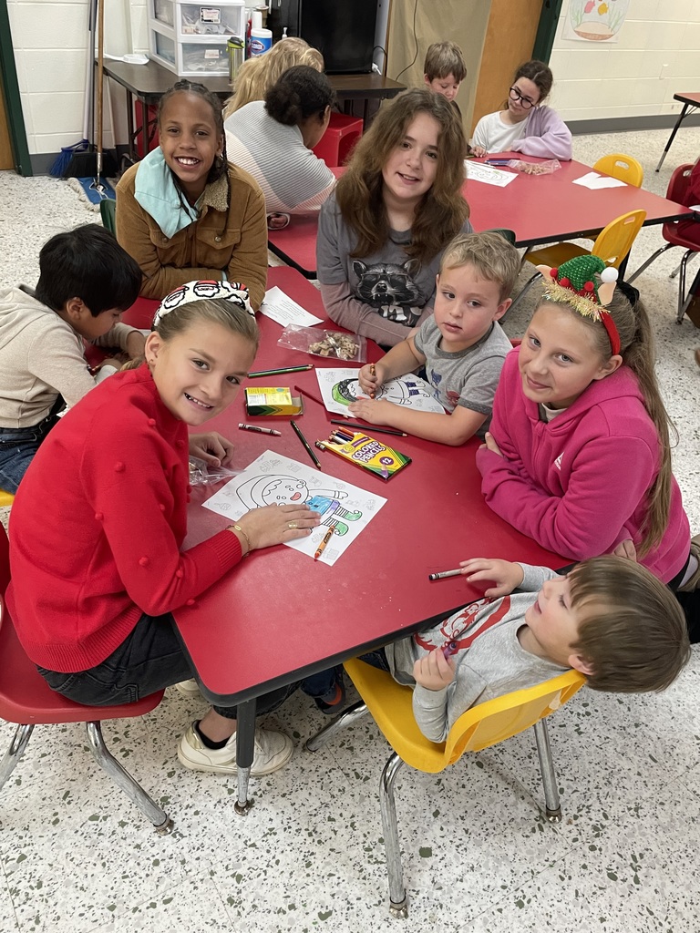 "Mrs. Croom and her Reading Buddies had a delightful visit with the Pre-K 3 students on December 4! Mrs. Croom read How to Catch an Elf, and the fifth-grade Reading Buddies jumped right in to help their little friends color an elf craft. They also led a fun finger play of “10 Little Elves Jumping in the Sleigh,” which had everyone giggling and moving along.  To top it all off, students enjoyed a special treat of homemade “Elf Bait”—the perfect festive snack to end their magical visit!"