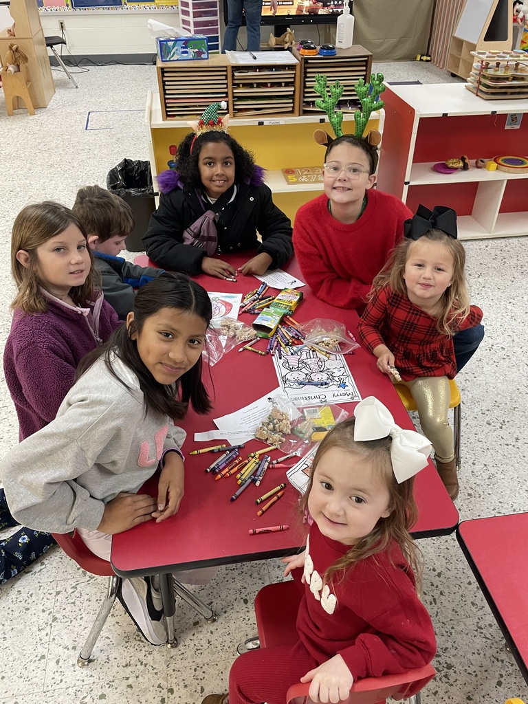 "Mrs. Croom and her Reading Buddies had a delightful visit with the Pre-K 3 students on December 4! Mrs. Croom read How to Catch an Elf, and the fifth-grade Reading Buddies jumped right in to help their little friends color an elf craft. They also led a fun finger play of “10 Little Elves Jumping in the Sleigh,” which had everyone giggling and moving along.  To top it all off, students enjoyed a special treat of homemade “Elf Bait”—the perfect festive snack to end their magical visit!"