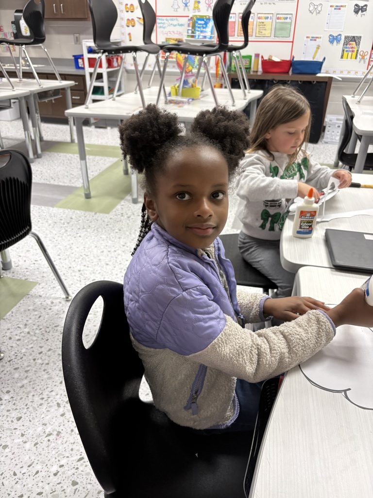 "Ms. Keyla would like to shout out the 1st Grade Craft Club ! These girls did an amazing job working together and helping each other with their craft!  Together they read the book ""The Day it Rained Hearts"" and made their very own rainy cloud! "