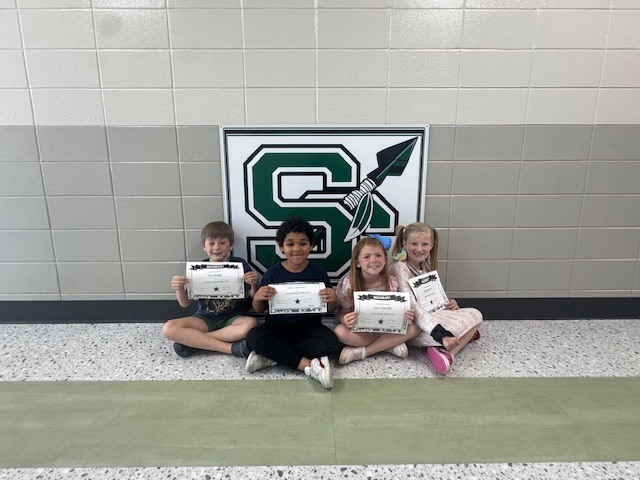 "🎉📚 Congratulations to the students in Mrs. Whitaker’s ELA classes! 📚🎉 **Tre Shingler **Aydan Anderson **Anna Claire Hill **Everleigh James **Not Pictured: Jariyah Akins  These hardworking students have passed 50 i-Ready Reading lessons—what an incredible accomplishment! Your dedication, focus, and effort are truly paying off.  Keep up the amazing work—we are so proud of you! 🌟"