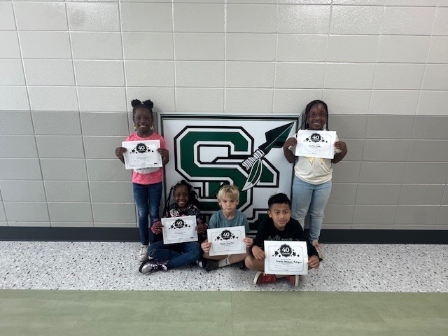 "🎉📚 Congratulations to the students in Mrs. Whitaker’s ELA classes! 📚🎉 **Precious Powell **Sariah McNair **Rhett Moulton **Ricardo Marquez-Rodriguez **Cardiay Kimble **Not Pictured: Demilah Virgin   These hardworking students have passed 40 i-Ready Reading lessons—what an incredible accomplishment! Your dedication, focus, and effort are truly paying off.  Keep up the amazing work—we are so proud of you! 🌟"