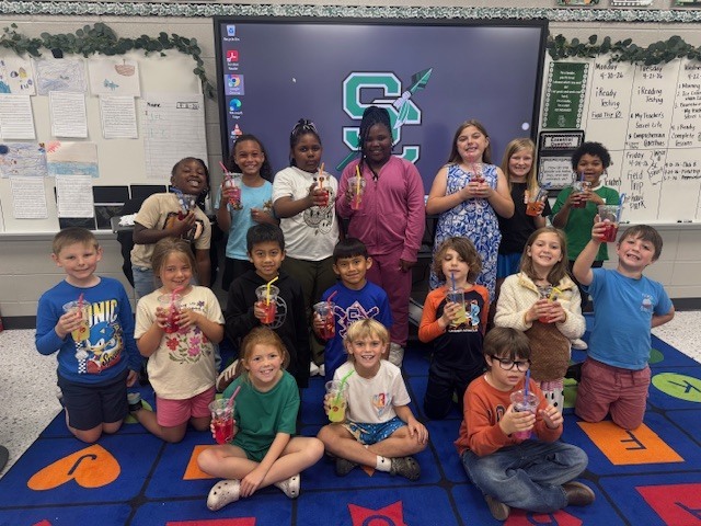 "  Mrs. Beth’s ELA classes celebrated completing their End-of-Year iReady Reading Diagnostic in style! 🎉 Students enjoyed a fun “Sip, Sip, Hooray!” iReady Treat Day featuring their very own custom-decorated cups, refreshing flavored water, and their favorite candies. 🍬🥤  We are so proud of all their hard work, growth, and perseverance this year. Way to go, readers! 💚📖  "