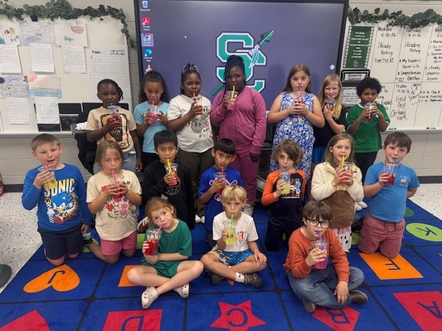 "  Mrs. Beth’s ELA classes celebrated completing their End-of-Year iReady Reading Diagnostic in style! 🎉 Students enjoyed a fun “Sip, Sip, Hooray!” iReady Treat Day featuring their very own custom-decorated cups, refreshing flavored water, and their favorite candies. 🍬🥤  We are so proud of all their hard work, growth, and perseverance this year. Way to go, readers! 💚📖  "