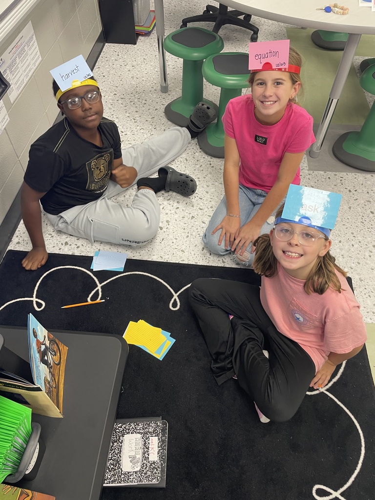 "📚✨ Learning + Fun = A Great Day! ✨📚 We had a great time reviewing our Unit 2 Reading Standards and Spelling today! Our students worked hard while having fun with hands-on activities. 📝📖 They especially enjoyed Headband Spelling, where they had to think, collaborate, and use their spelling skills. We also went on a scavenger hunt around the classroom to find and categorize different character traits. 🔎🧠 I love seeing my students engaged, moving, thinking, and learning together! 💚🖤🤍 Great job, 5th grade! Keep up the hard work! 👏📚"