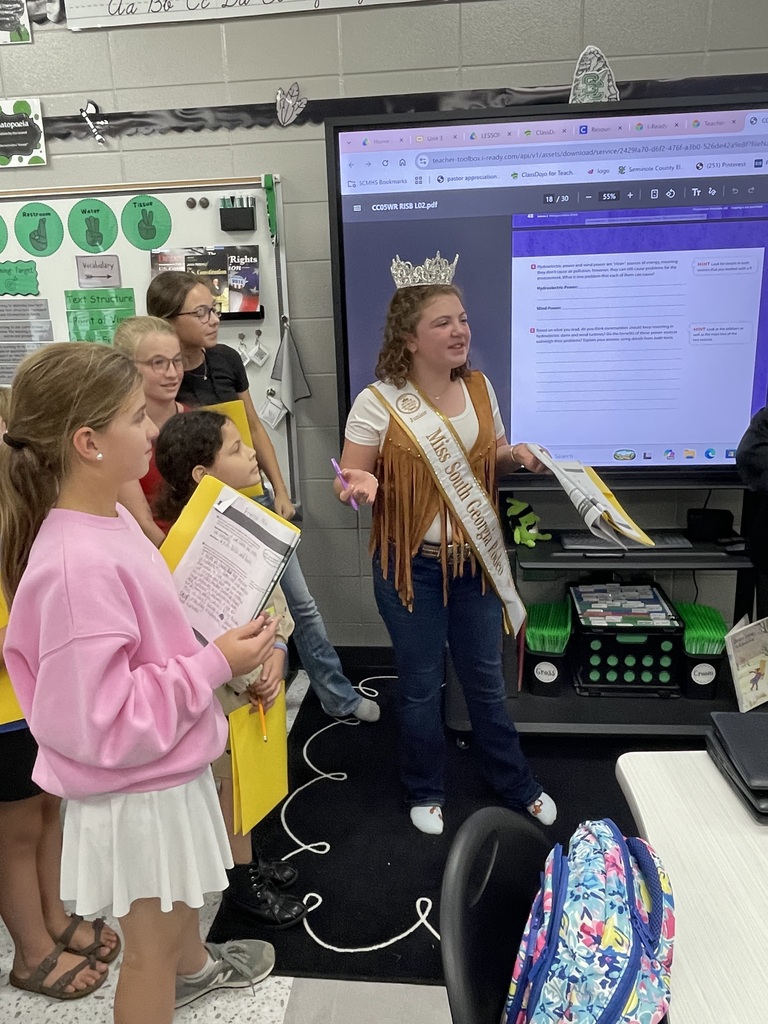 "⚡️ Expository Writing in Mrs. Croom’s ELA Class! 🌬️💨  After reading two informational texts as part of our expository writing unit, Mrs. Croom’s ELA students engaged in a lively debate about the use of hydroelectric plants and wind turbines as sources of energy.  Students responded to a writing prompt asking whether communities should continue to fund each of these energy sources. They had to take a position, defend their reasoning, and support their ideas with evidence from both texts.  Students also had to consider both sides of the issue by explaining whether the benefits outweigh the problems associated with each energy source.  We are working hard to become stronger writers by learning to use evidence, explain our thinking, and support our claims! 📝📚💚"