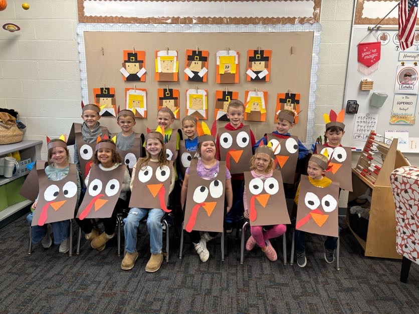 Kids in turkey costumes.