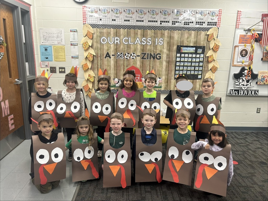 Kids in turkey costumes.