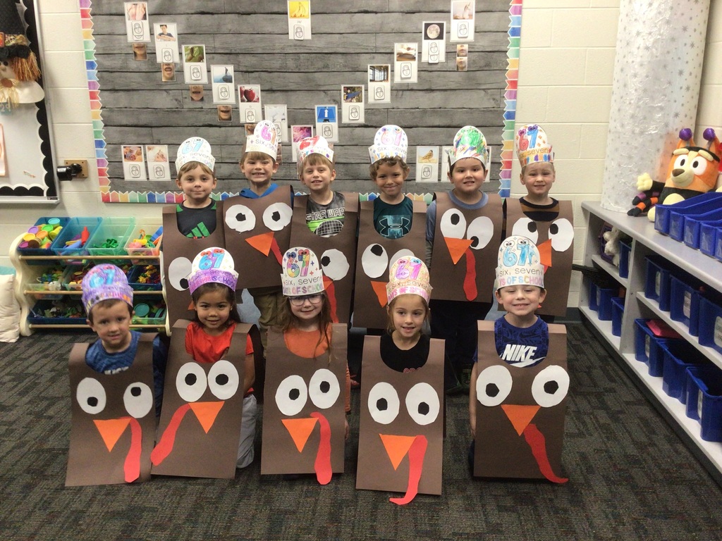 Kids in turkey costumes.