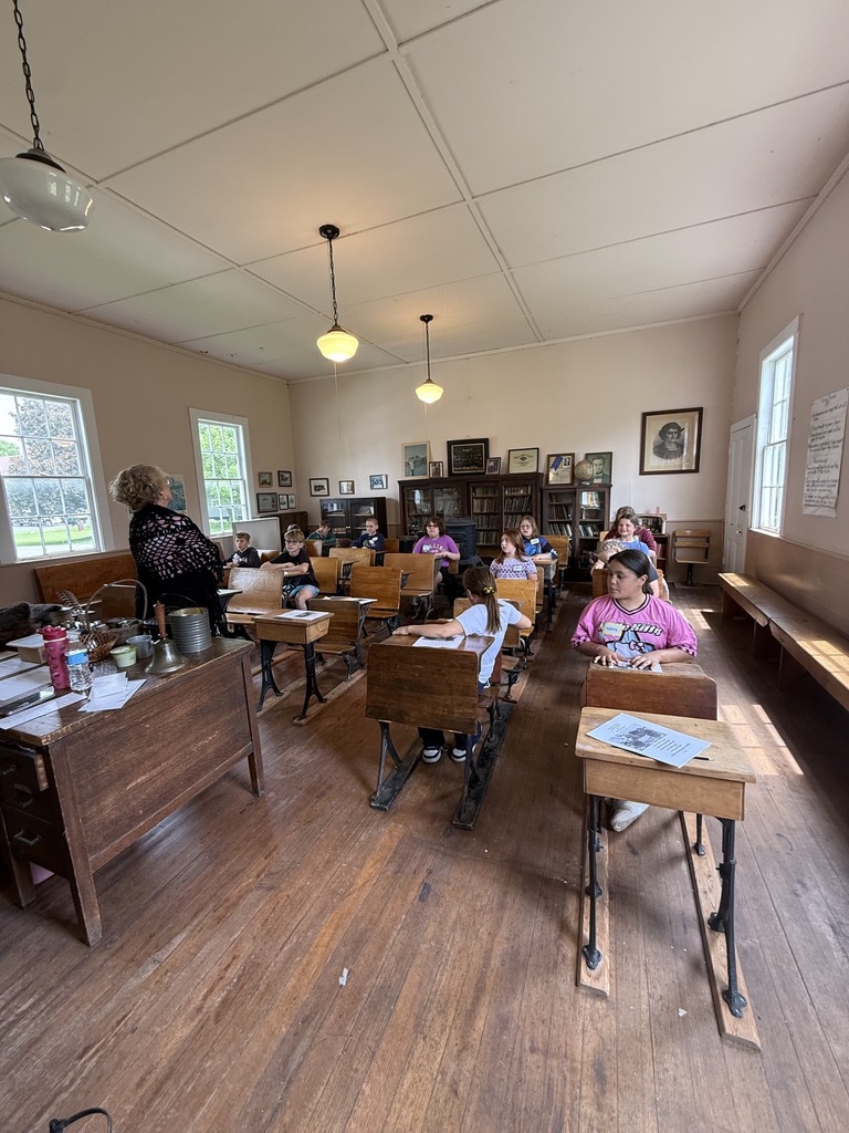 Students inside schoolhouse