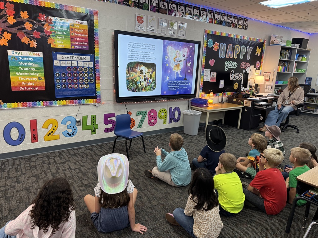 First grade learning about Dolly Parton’s childhood