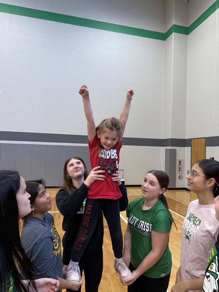 The Seneca High School Cheer team hosted their annual Holiday Cheer Camp on Sunday.