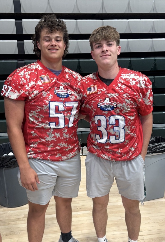 Seniors Cam Shriey and Zeb Maxwell put on their Irish helmets one last time in the Illinois High School Shrine Football Game on Saturday. 