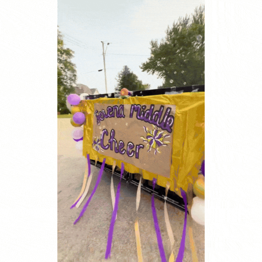 Cheer team on float