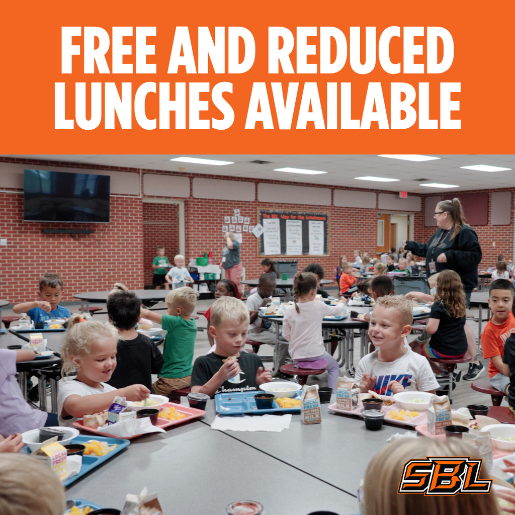 Free and reduced lunches available, image of children in the lunch room