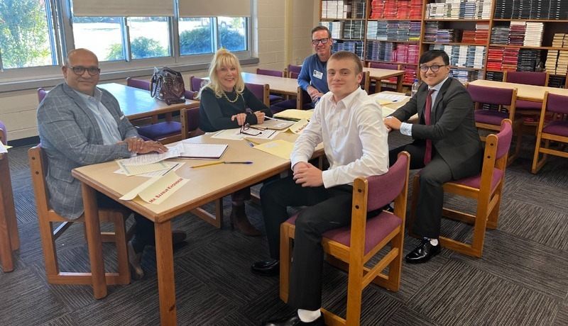Group discussing at library table