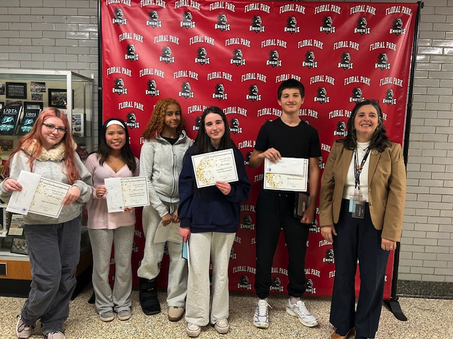 Students holding certificates