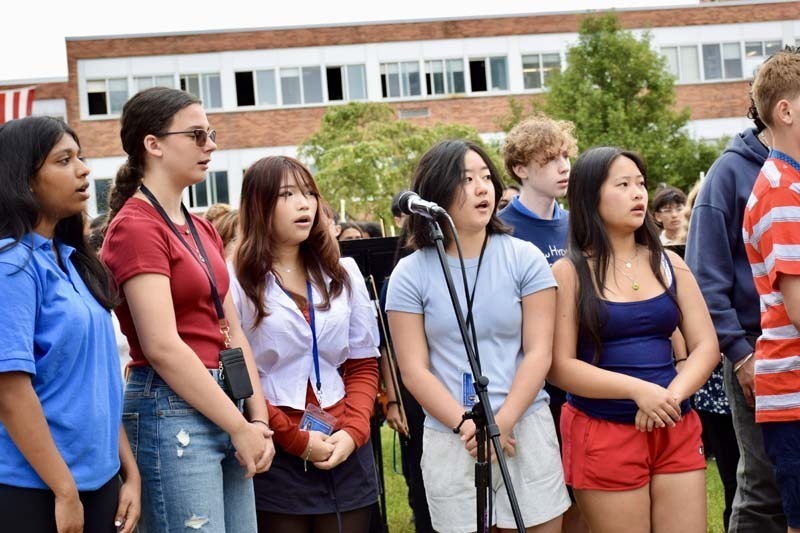 Group of girls singing.