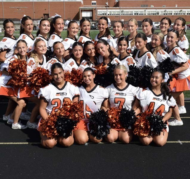 Group photo of cheerleading team.