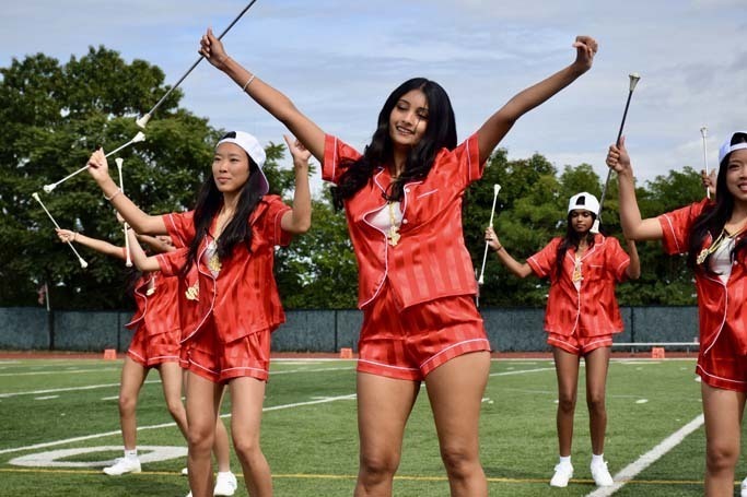 Student baton twirlers performing.