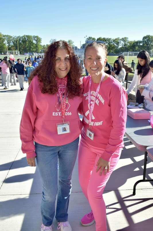 students and staff dressed in pink