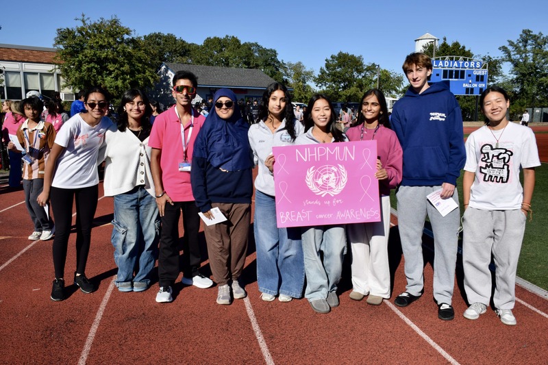 students and staff dressed in pink