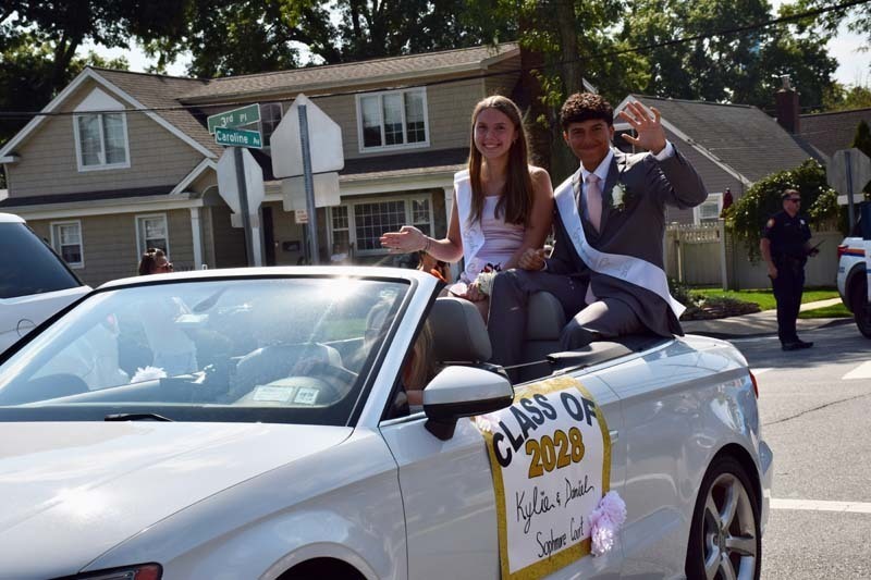 Students in the homecoming court are pictured in the parade