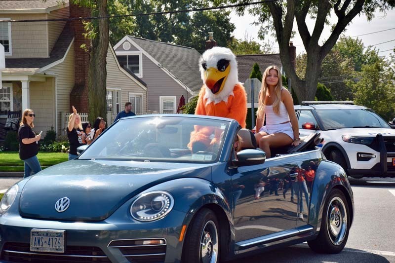 H. Frank Carey’s homecoming parade kicked off