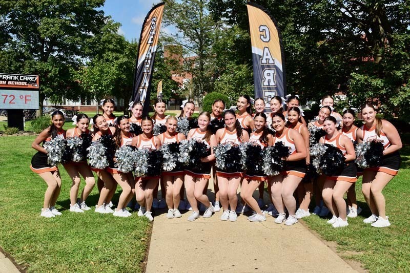 Pirettes team pose for a photo before the parade.