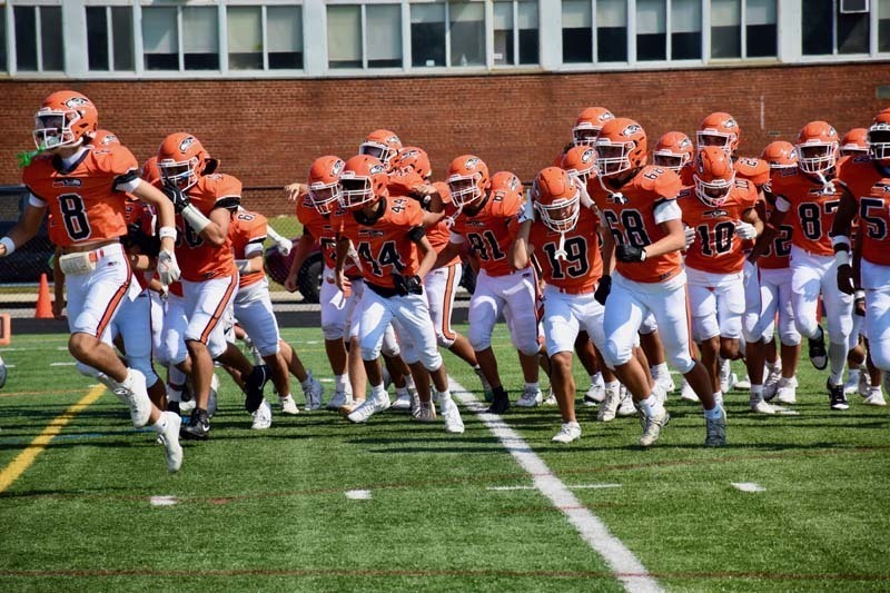 The Carey Seahawks enter the field for the homecoming game
